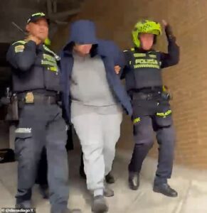 Texas man whose ‘child abuse’ balcony video in Colombia sparked outrage is CLEARED as police say he was helping boy who was choking