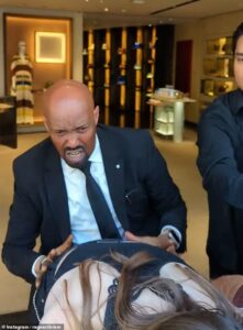 Hero security guard insists ‘I was just doing my job’ after footage of Fendi store he was protecting from anti-fur protesters prompts calls for a pay rise