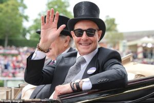 Stanley Tucci joins the King and Queen for Ascot procession with wife Felicity Blunt as they enjoy a day out at the races alongside Carole Middleton and the Duchess of Edinburgh