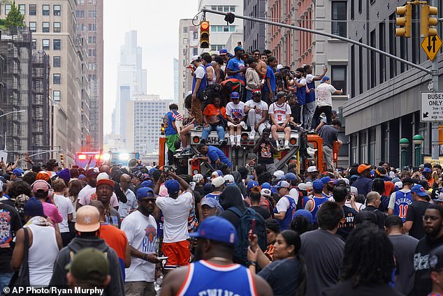 Knicks fan is slashed in the neck with glass bottle as NBA title parade turns ugly