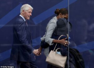 Bill Clinton’s VERY cozy moment with Michelle while Hillary looks the other way… and the best UNSEEN moments from Obama public library opening