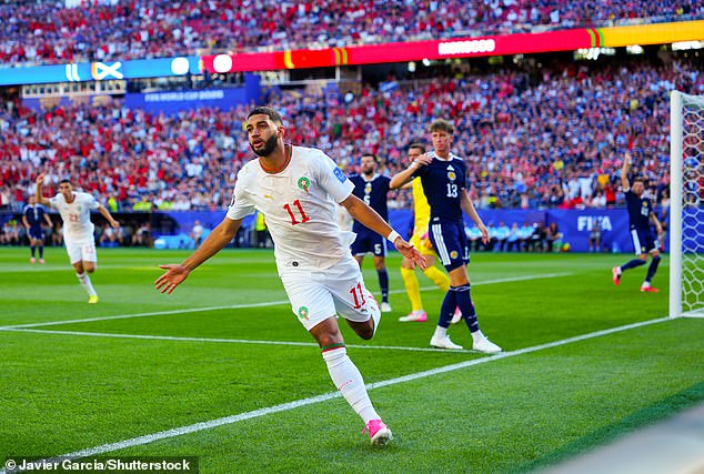 SCOTLAND 0 MOROCCO 1: Early lapse leaves Scotland with a mountain to climb as they squander chance to make history