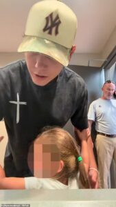 Mom of girls in viral bathroom video says the footage has destroyed her as she accuses their father of failing to financially support daughters and exploiting them for attention