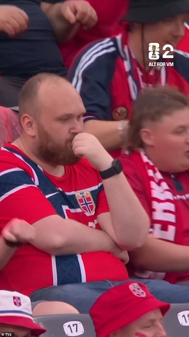 The ONE Norwegian fan refusing to join in with team’s viral World Cup celebration! Hilarious moment single supporter sits still as thousands do ‘The Viking’
