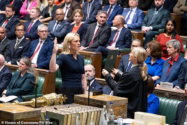 New SNP MP is accused of putting on ‘fake’ Scottish accent as she crossed her fingers while pledging allegiance to the King
