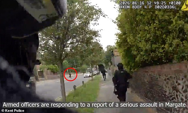 Moment van driver stops and gives armed police a LIFT to chase a suspect