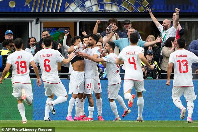 IAN HERBERT: The US and vast Iranian diaspora may be at war with this team, but Iran are winning friends and respect at the World Cup – yes, they’re cohering with their Islamic dictatorship but they’re just footballers