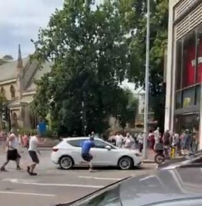 Somalia-born man, 34, is charged with attempted murder after five people were struck by a car in London