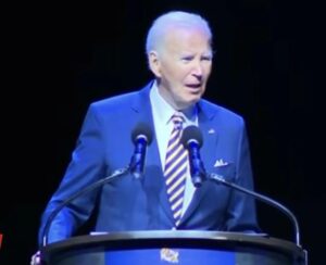Awkward moment mumbling Joe Biden is interrupted by shouting hecklers… as he tears into Trump over three ‘failures’ and calls him a ‘loser’