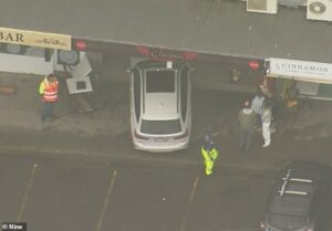 Boy, seven, rushed to hospital after car smashed through chicken shop and ploughed into table where he was eating
