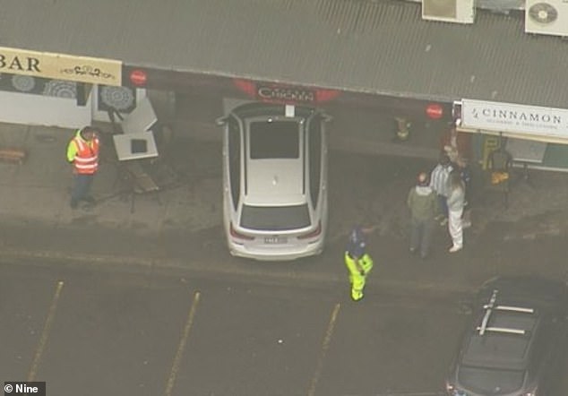 Boy, seven, rushed to hospital after car smashed through chicken shop and ploughed into table where he was eating