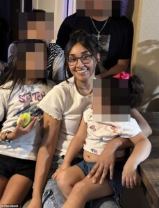 Two young sisters smile for the camera as they’re arrested for stabbing mom-of-five to death in broad daylight