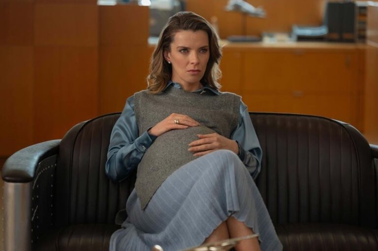 Betty Gilpin Answers Everyone’s Big Questions About That Graphic Office Romance Scene
