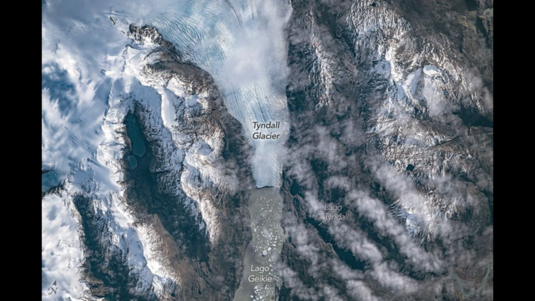 Astronauts watch from space as ice splinters from a glacier photo of the day for June 11, 2026