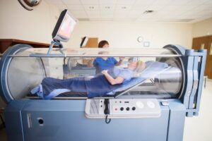 Hyperbaric oxygen therapy is being explored as a long COVID treatment. Here’s what the research shows