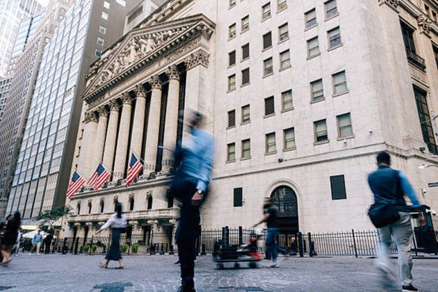 Wall Street is in the green as investors await Federal Reserve rate policy