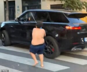 Boy who won social media fame by pushing women into water and squirting cyclists in Paris hires lawyer to sue his critics for ‘racism’