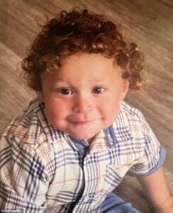 Parents of toddler found ALIVE in hospital morgue are cleared… as chilling records reveal cops repeatedly warned doctor he was still breathing