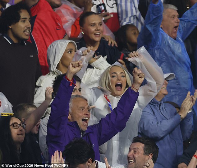 Kate Kane and Megan Pickford celebrate in the stands as their Three Lions husbands beat Mexico