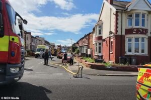 Boy, 13, dies in house fire ‘after e-bike charger exploded’ as 19-year-old man fights for life in hospital