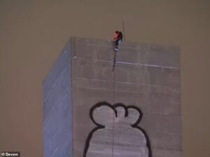 Graffiti artist launches furious protest against Australian government by shutting down bridge: ‘Lower the taxes’