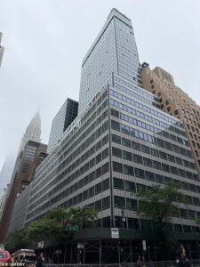 Huge Midtown Manhattan building evacuated over fears it is on verge of COLLAPSE after construction workers noticed cracks and buckling columns