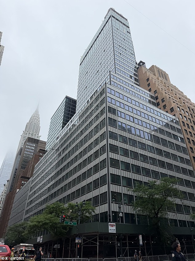 Huge Midtown Manhattan building evacuated over fears it is on verge of COLLAPSE after construction workers noticed cracks and buckling columns