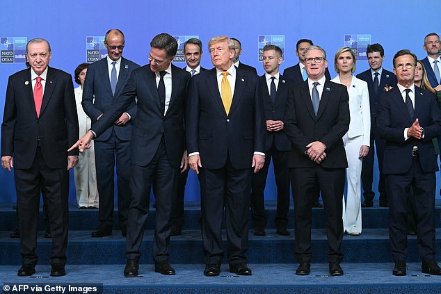 Wish you weren’t Keir? Starmer endures awkward moment next to Trump at NATO summit – after President renewed jibes over Iran