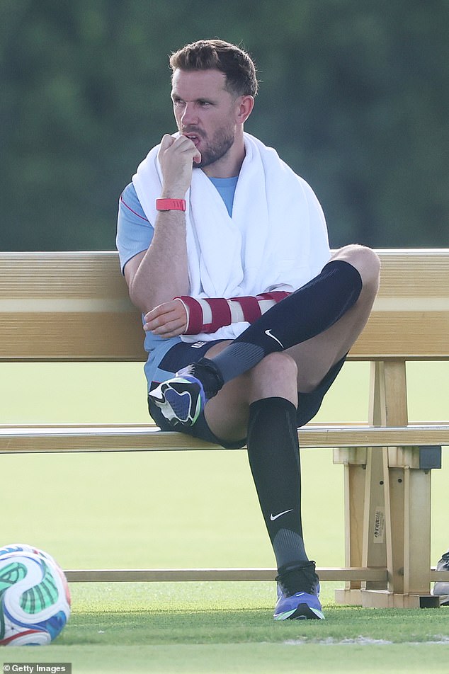 Unlucky Jordan Henderson watches England training session in a cast as Three Lions star is seen for the first time since surgery after he broke his wrist in freak accident during Azteca celebrations
