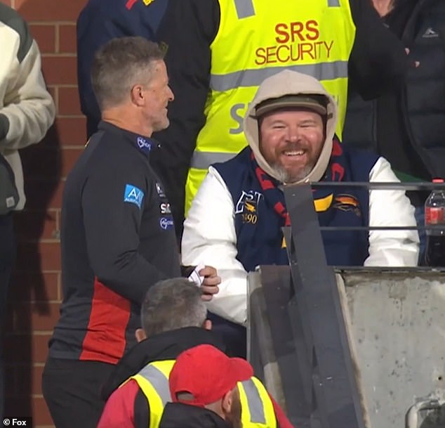 AFL coach lashes out at ‘peanut’ fans who ‘live in their mum’s basement’ after stunning clash with crowd during match: ‘It’s dangerous’