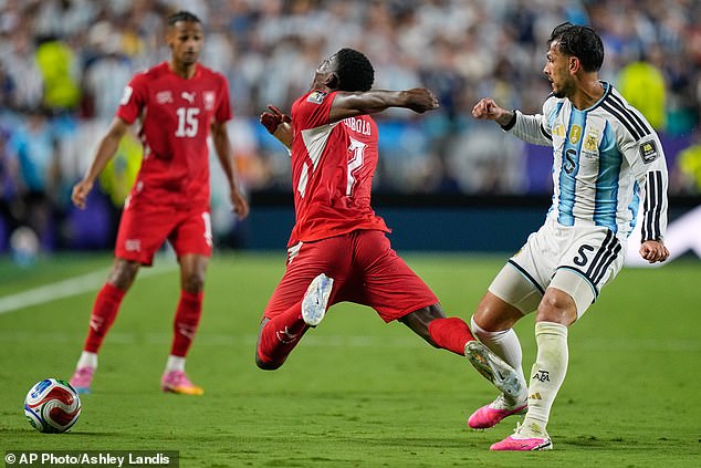 Switzerland’s Breel Embolo breaks down in TEARS after being sent off for diving during Argentina World Cup clash – as distraught striker becomes first player to receive a red card via new VAR rule over mistaken identity