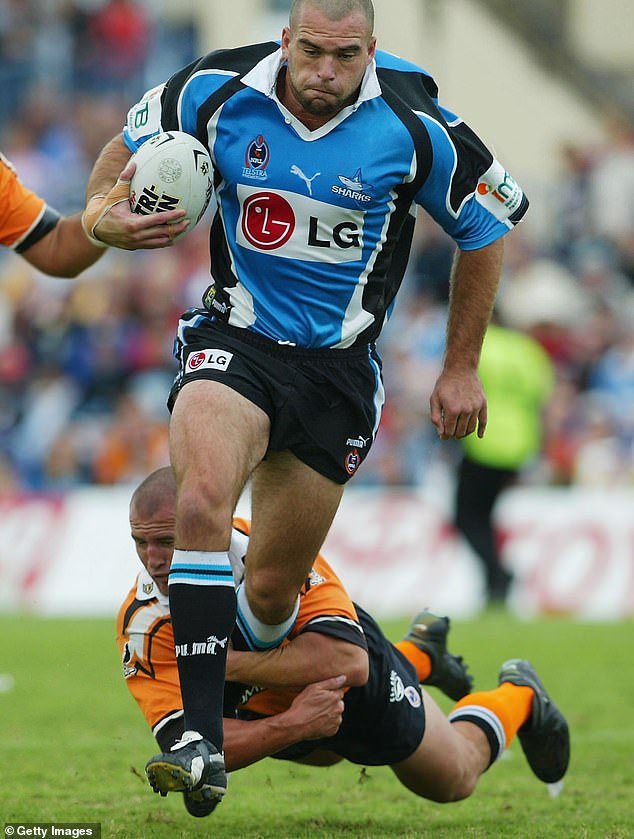 Aussie footy star Karl Lovell dies aged just 48 – leaving behind a wife and two daughters