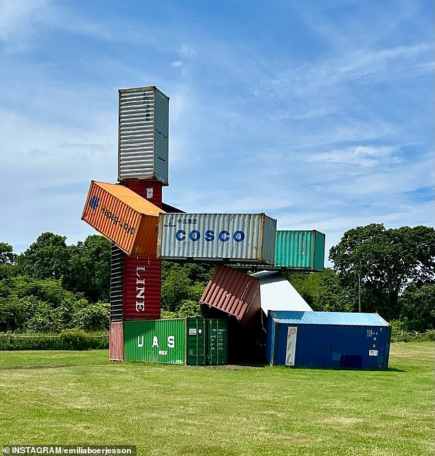 Legal fight erupts over shipping container sculpture in posh Hamptons enclave as residents label towering display ‘junkyard mess’