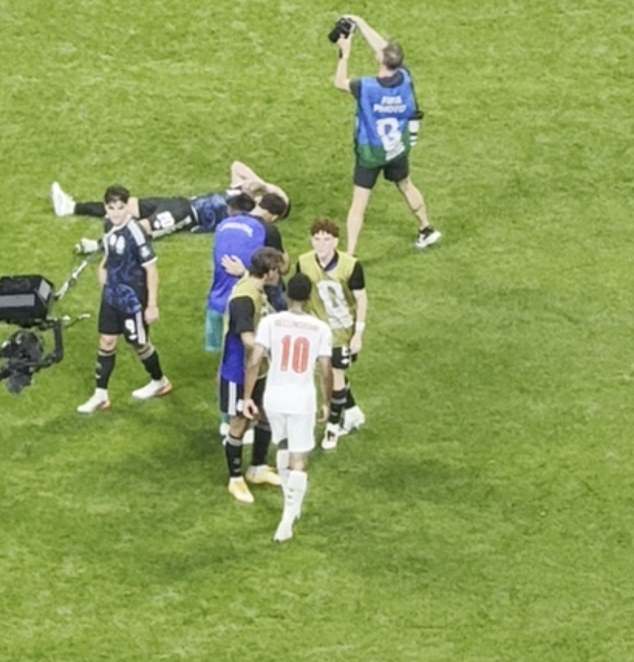 New footage emerges of Jude Bellingham clashing with jubilant Argentina players on the pitch as they celebrate sending England home from the World Cup