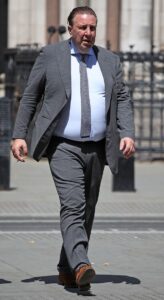 Pavarotti’s tailor caused his own £1million French wine collection to go mouldy by turning off ‘noisy’ fridges after neighbours complained, judge rules – as he is handed £110k court bill