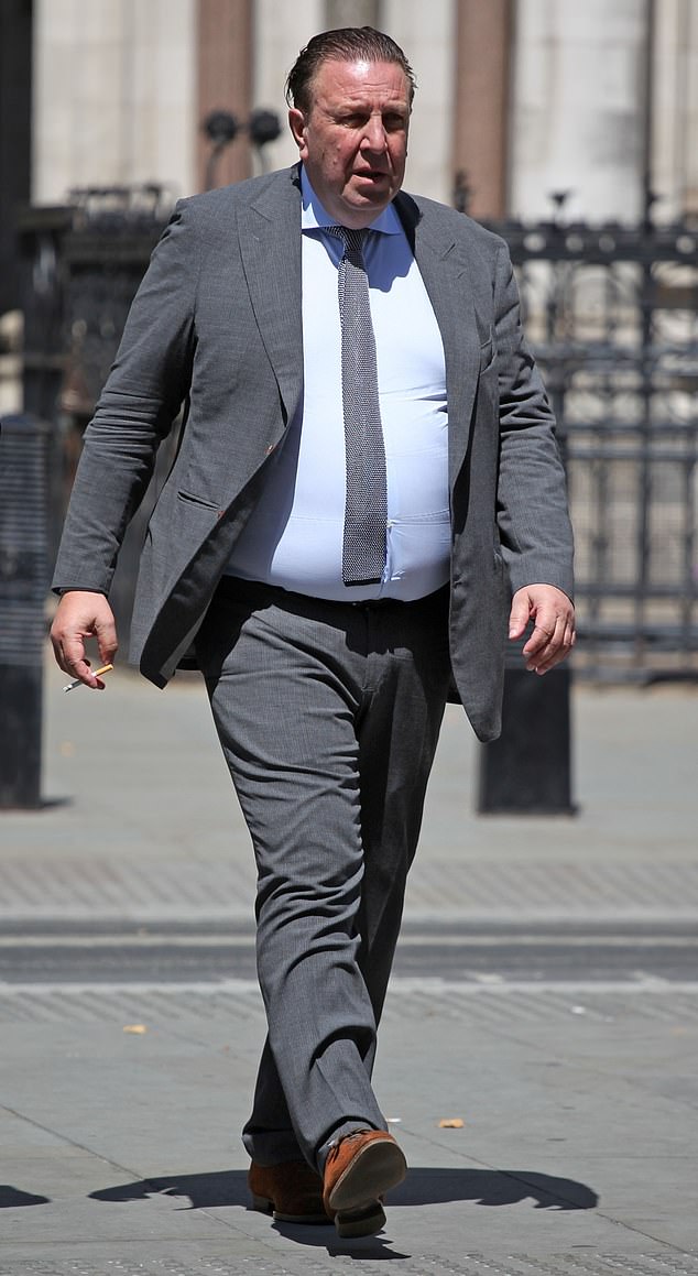 Pavarotti’s tailor caused his own £1million French wine collection to go mouldy by turning off ‘noisy’ fridges after neighbours complained, judge rules – as he is handed £110k court bill