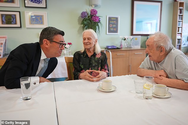 ‘What, a new one? They keep changing every 5 minutes’: Care home resident speaks for Britain after meeting Burnham and being surprised to learn he is yet another new Prime Minister