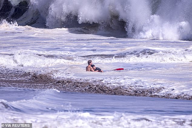 Father reveals terrifying moment his 10-year-old boy blacked out in ferocious surf before teen hero’s dramatic ocean rescue: ‘He knew he was drowning’