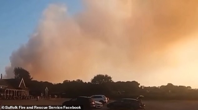 Holidaymakers evacuated as firefighters battle huge wildfire in Suffolk