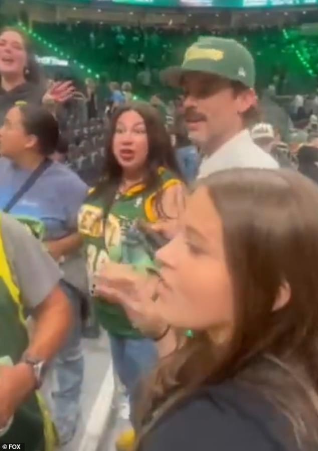 Seattle Storm fans caught lashing out at Sophie Cunningham allies… as another appears to spit on a Fever supporter amid trans debate