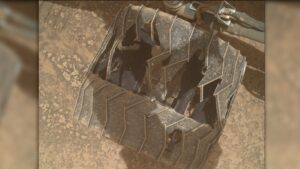 Curiosity Mars rover inspects cracked wheel photo of the day for July 27, 2026