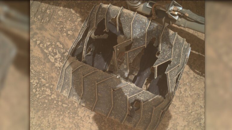 Curiosity Mars rover inspects cracked wheel photo of the day for July 27, 2026