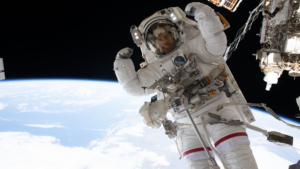 Astronaut flexes his muscles mid-spacewalk photo of the day for July 7, 2026