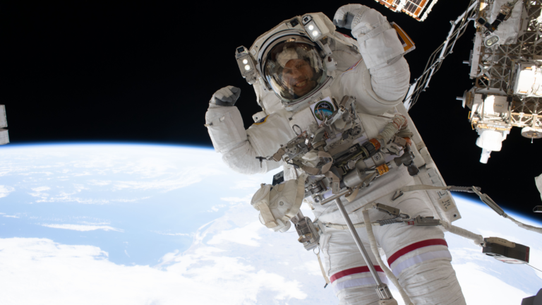 Astronaut flexes his muscles mid-spacewalk photo of the day for July 7, 2026