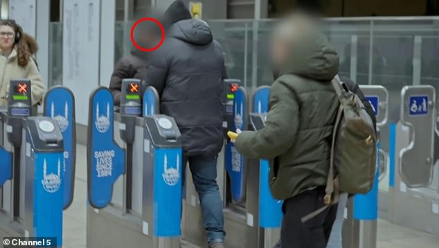 Moment fare dodger who went on £2,200 worth of Elizabeth line journeys without paying a penny is caught by TfL investigators
