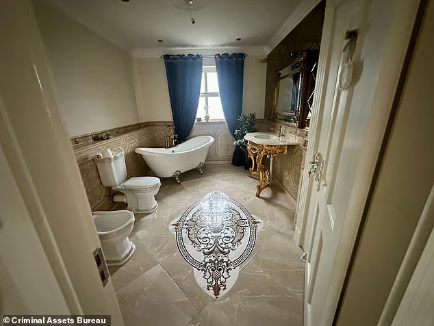 Inside the luxury homes of Ireland’s gangland kingpins: Lavish lives of Irish mob clans including Kinahans are revealed as cops seize gold watches, designer bags and sports cars