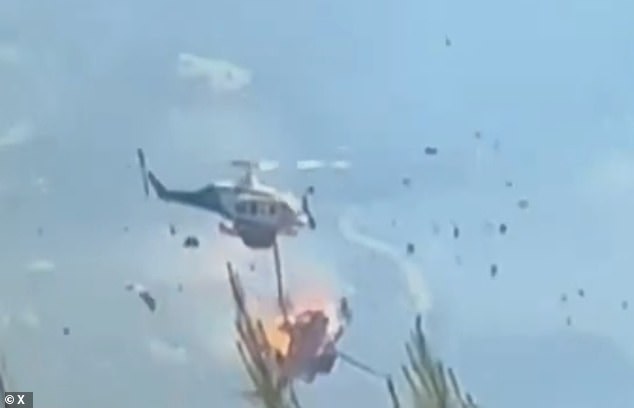 Two helicopters collide while fighting wildfires in Greece