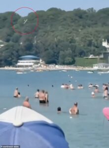 Moment Ukrainian drone kills sunbathers on Russian beach near Putin’s £1billion palace as Kyiv unleashes its most intense bombardment of the war