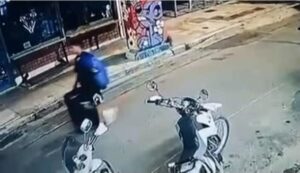 Moment ‘Afghan small-boat migrant drags suitcase with British woman’s body inside down Athens street’
