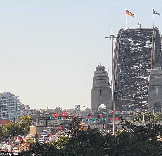 Sydney Harbour Bridge crash: Three people trapped in wreckage as traffic is brought to a standstill